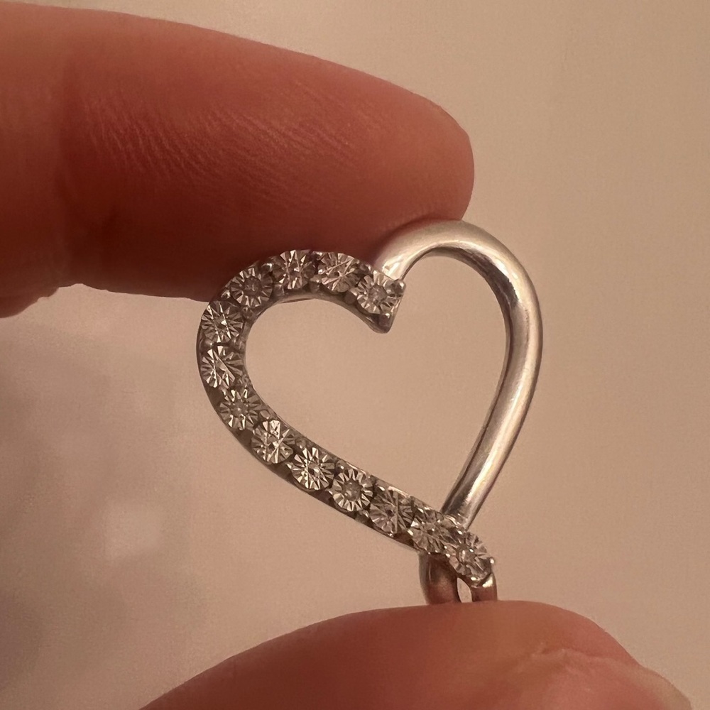 sterling Silver pendant with probe and 5 tiny diamonds without chain